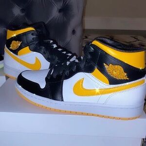 A mid Nike air Jordan sneaker for men or women